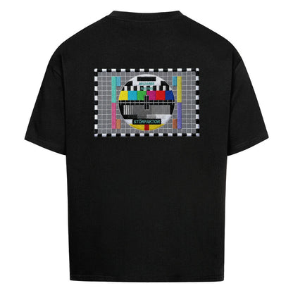 Schwarzes STÖRFAKTOR Oversized Motorrad T-Shirt mit großem Testbild-Rückenprint. Schweres Biker Shirt aus 100 % Baumwolle mit Streetwear-Charakter für Motorradfahrer und Schrauber.