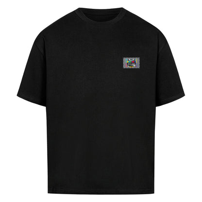 STÖRFAKTOR Oversized Motorrad T-Shirt in Schwarz mit kleinem Testbild-Logo auf der linken Brust. Schweres 240 GSM Baumwollshirt mit lässigem Oversized Fit und Dropped Shoulders von Mazares Racing.