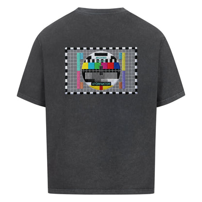 STÖRFAKTOR Motorrad T-Shirt in Washed Black mit großem Retro-Testbild-Design auf dem Rücken. Oversized Streetwear Shirt für Biker und Motorrad-Enthusiasten.